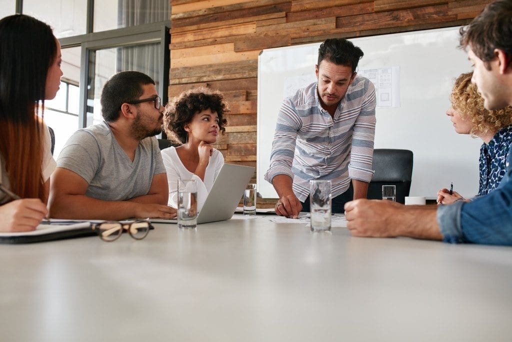 Business team discussing progress of the company